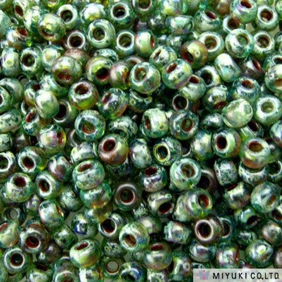 6-4506, Miyuki 20g Transparent Picasso Olivine
